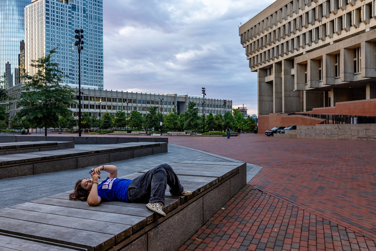 Aris Apollos, waiting for a train while resting outside of City Hall Plaza, is not a fan of the architecture.
