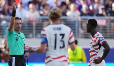 Referee Raphael Claus of Brazil shows a red card to United States' Folarin Balogun, right, during the World Cup round of 32 soccer match between the United States and Bosnia and Herzegovina in Santa Clara, Calif. on Wednesday.