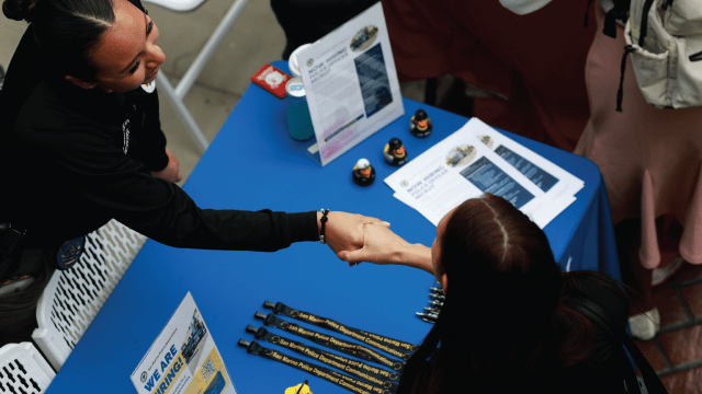 A job seeker meets with a recruiter at a job fair in Carson, California, on June 30, 2026. (Justin Sullivan/Getty Images)