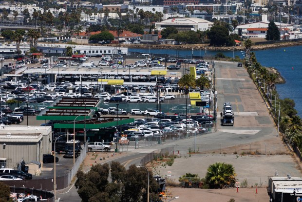 The car rental lots back up to Liberator Way on East Harbor Island, as pictured on July 14, 2026. (Kristian Carreon / The San Diego Union-Tribune)