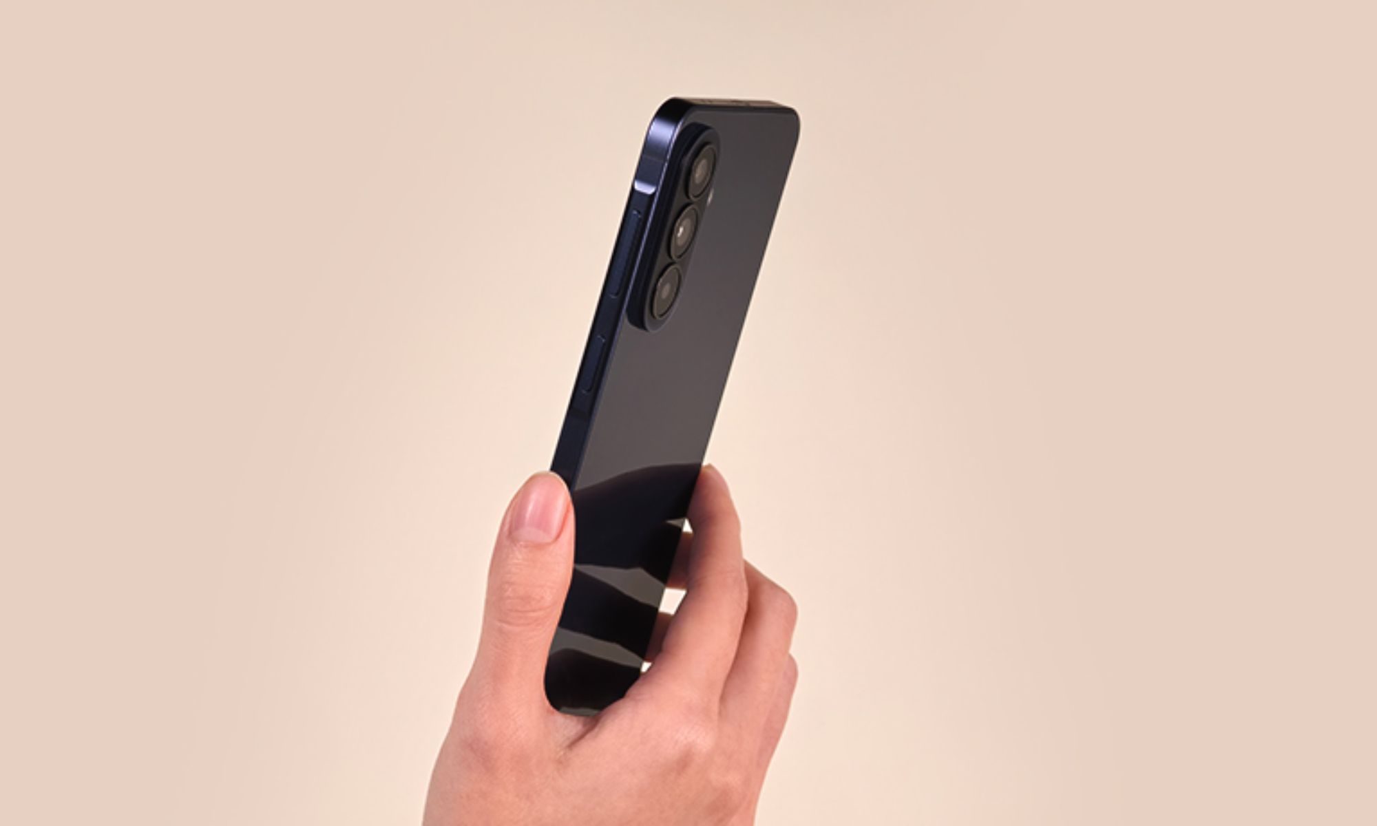 Samsung Galaxy A57 in black in hand