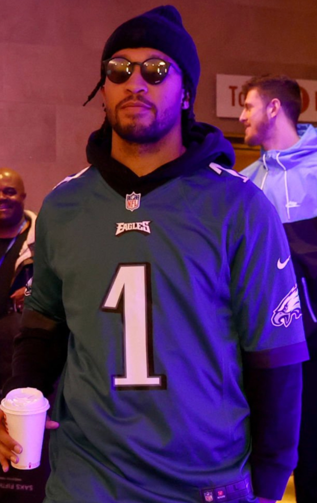 Jalen Brunson wearing a Jalen Hurts jersey. 