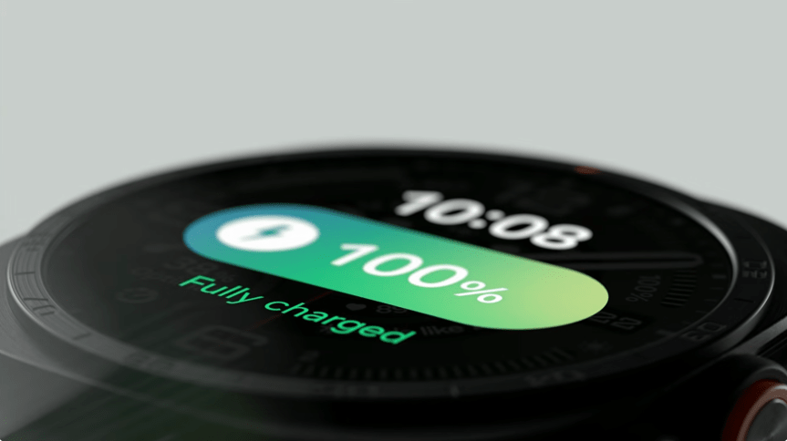 A smart watch face showing that the battery of the watch is charged to 100%.