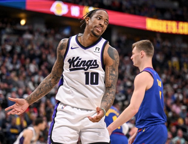 DeMar DeRozan (10) of the Sacramento Kings reacts to scoring, but not drawing a foul from the Denver Nuggets defense during the fourth quarter of the Nuggets' 116-110 win at Ball Arena in Denver on Wednesday, March 5, 2025. (Photo by AAron Ontiveroz/The Denver Post)