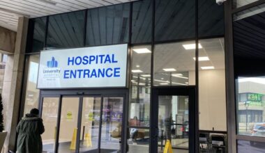 A person walks into University Hospital in Newark, N.J. New Jersey has had one of the largest drops in deaths rates since 2015, according to a Stateline analysis.