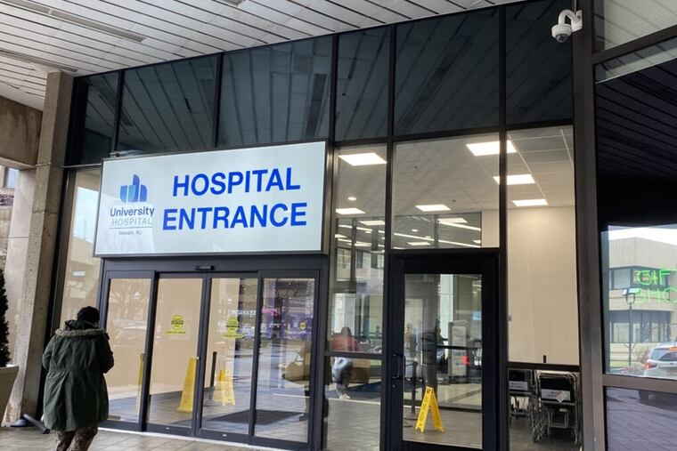 A person walks into University Hospital in Newark, N.J. New Jersey has had one of the largest drops in deaths rates since 2015, according to a Stateline analysis.