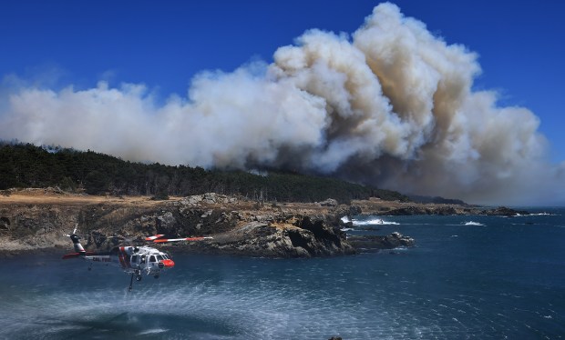 The Woodside Fire burns at Salt Point State Park, Thursday, July 30, 2026. (Kent Porter / The Press Democrat)