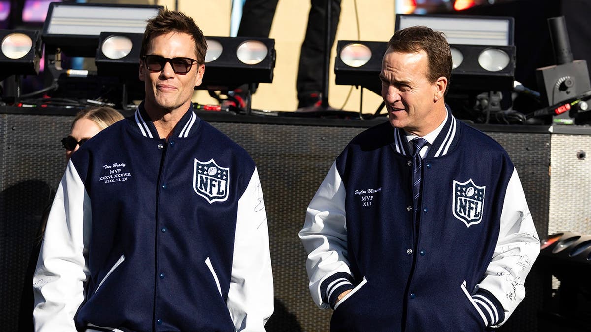 Tom Brady and Peyton Manning stand before Super Bowl LX at Levi's Stadium.