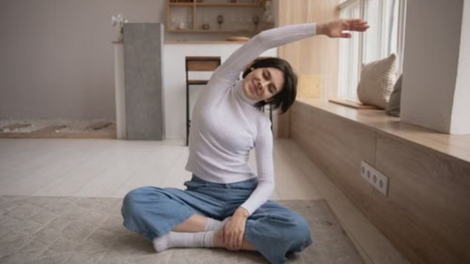 Woman doing a sitting exercise at home