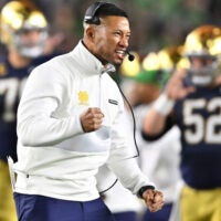 Oct 14, 2023; South Bend, Indiana, USA; Notre Dame Fighting Irish head coach Marcus Freeman celebrates after a Notre Dame interception against the USC Trojans at Notre Dame Stadium.