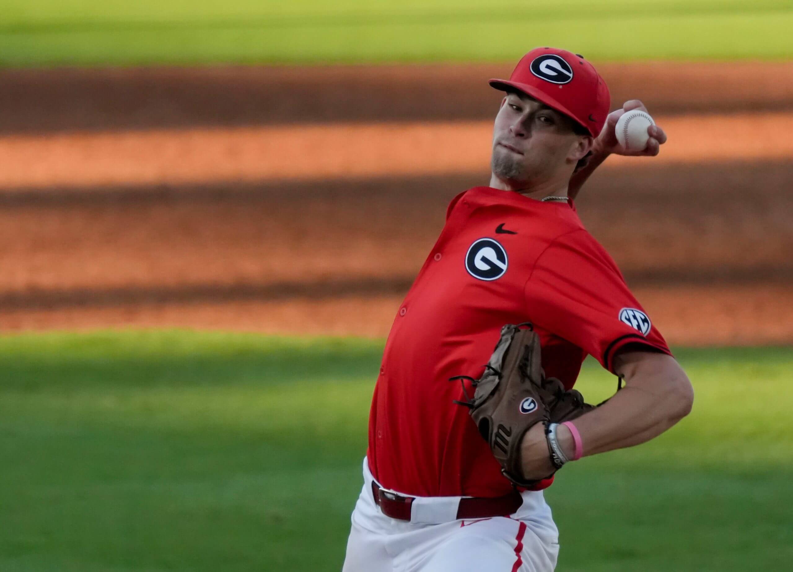 May 21, 2025; Hoover, AL, USA; Georgia pitcher JT Quinn (22) makes a pitch during the game with Oklahoma in the second round of the SEC Baseball Tournament at the Hoover Met. 
