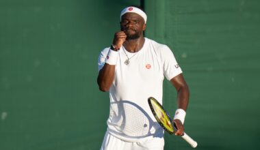 Frances Tiafoe celebrates a point at Wimbledon in 2026.