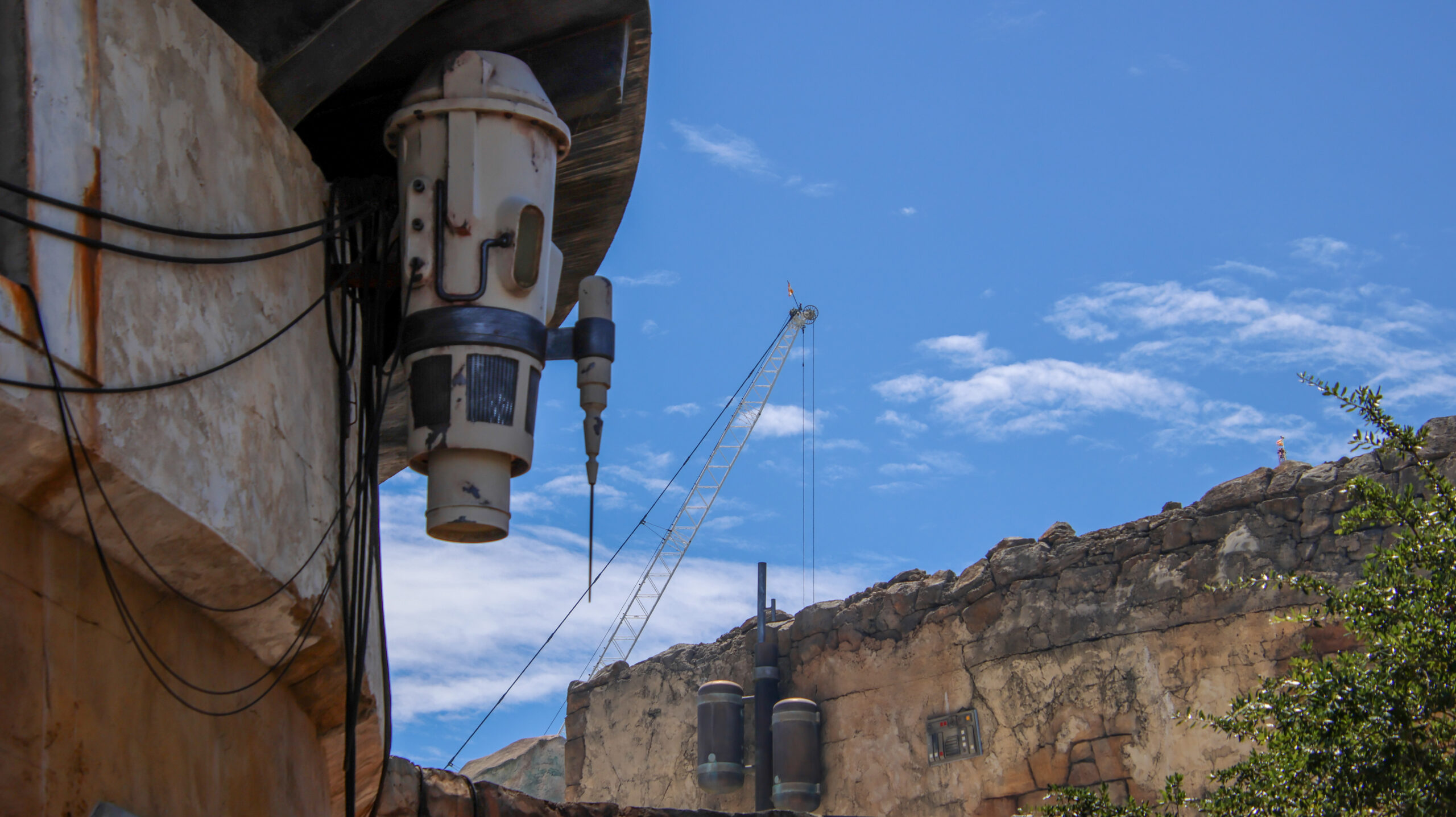 Construction of the upcoming Monsters, Inc. roller coaster continues to reshape the skyline of Disney’s Hollywood Studios, with a towering crane now visible from other areas of the park.