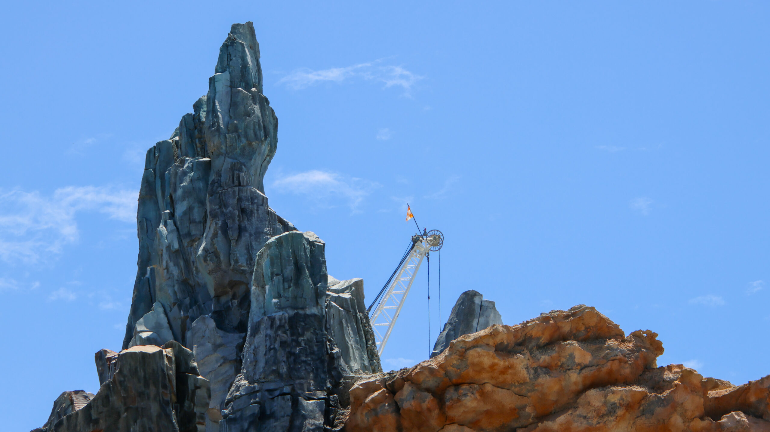 Construction of the upcoming Monsters, Inc. roller coaster continues to reshape the skyline of Disney’s Hollywood Studios, with a towering crane now visible from other areas of the park.