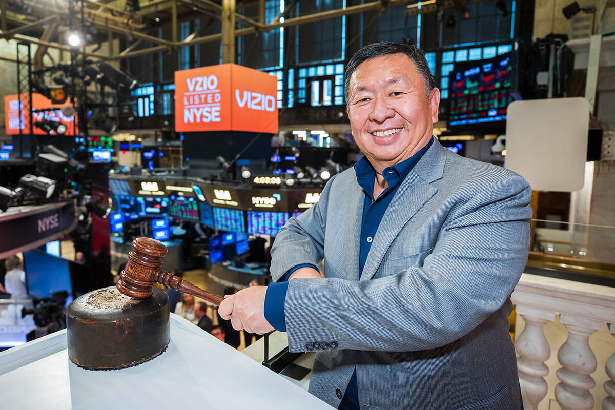 William Wang, B.S. ’86, founder and CEO of Vizio, rings the closing bell at the New York Stock Exchange, in celebration of his 2023 Emmy Award for Technology and Engineering. Photo Credit: NYSE