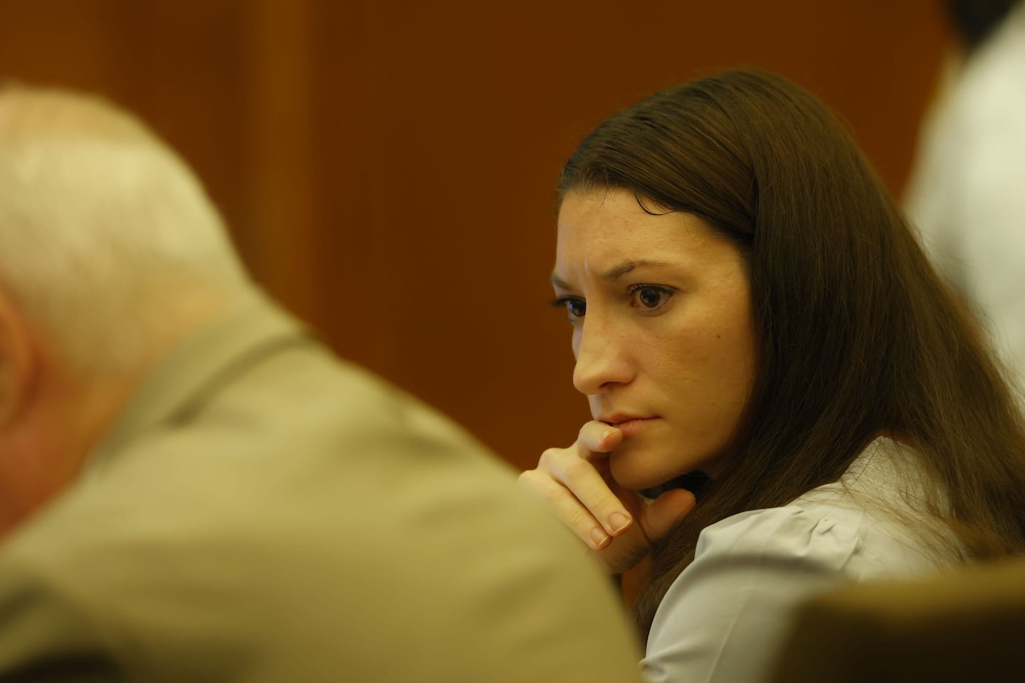 Defendant Lindsay Clancy listens during her murder trial Thursday at the Plymouth Superior Court.