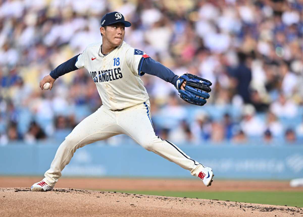 Jul 11, 2026; Los Angeles, California, USA; Los Angeles Dodgers pitcher Yoshinobu Yamamoto (18) throws during the second inning against the Arizona Diamondbacks at Dodger Stadium. Mandatory Credit: William Liang-Imagn Images