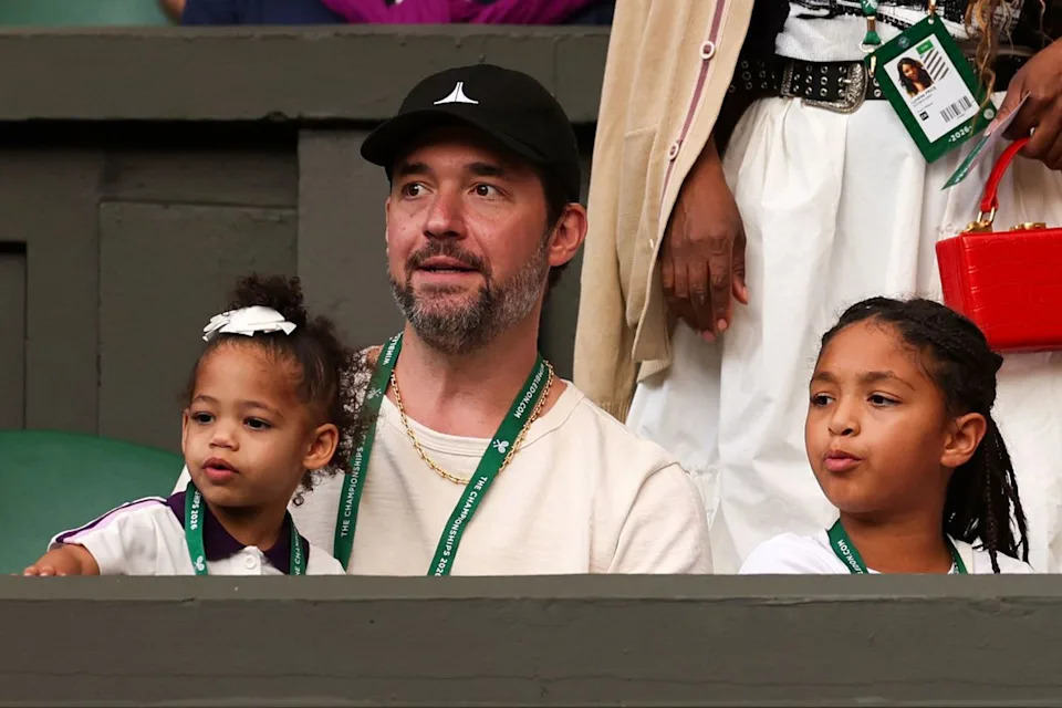 (L-R) Adira, Alexis and Olympia Ohanian cheer on Serena Williams at WimbledonCredit: Ella Ling/Shutterstock
