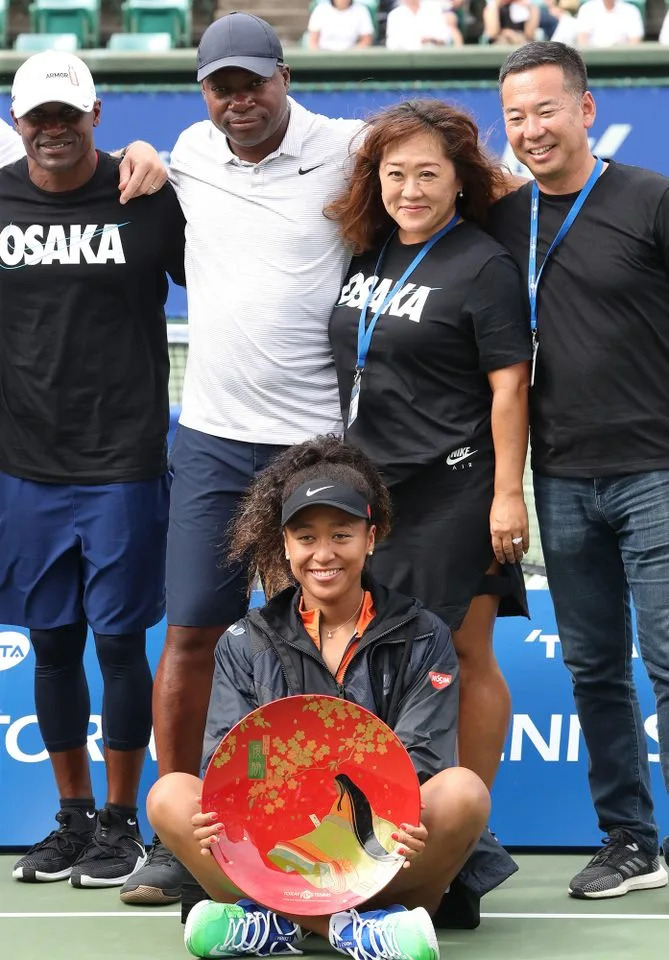 Leonard Francois and Tamaki Osaka with Naomi Osaka in 2019.Credit: Yoshio Tsunoda/AFLO/Alamy
