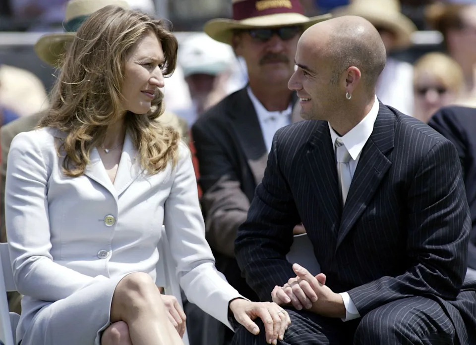 Steffi Graf and Andre Agassi during the the Class of 2004 induction ceremony at the International Tennis Hall of FameCredit: Joe Giblin/WireImage
