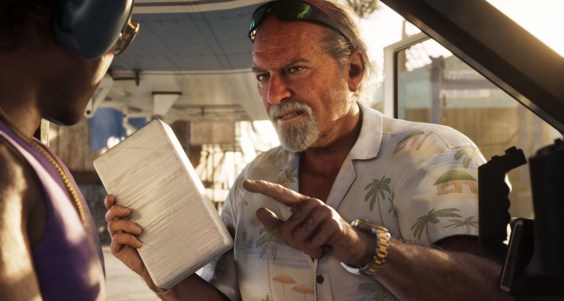 A man points his finger menacingly while holding a paper.