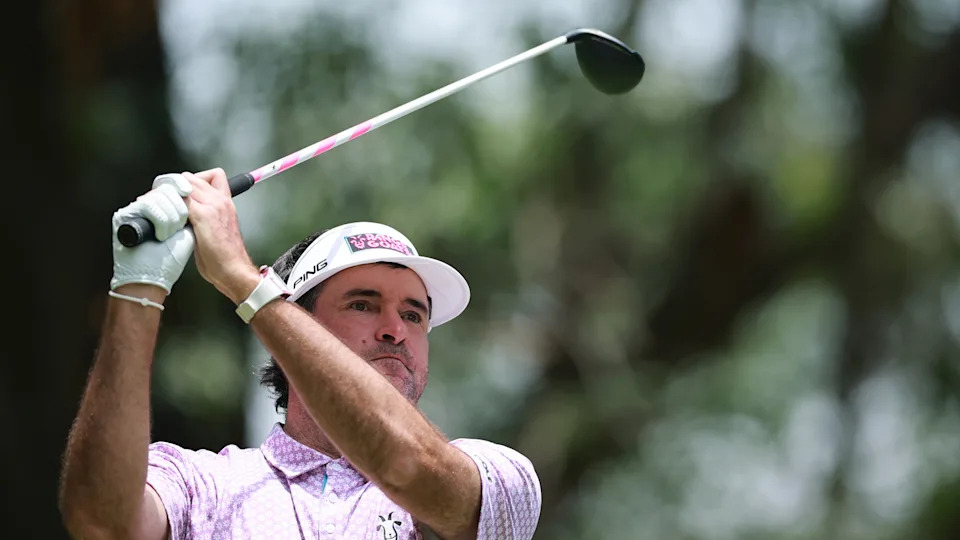 Bubba Watson hits a fairway wood
