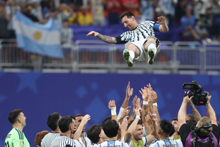 Argentina's forward #10 Lionel Messi is lifted by teammates as they celebrate after winning the 2026 World Cup round of 16 football match between Argentina and Egypt at Atlanta Stadium in Atlanta on July 7, 2026.