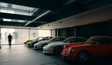 black resin, glass, and steel shape alessandro isola's automotive sanctuary in italy
