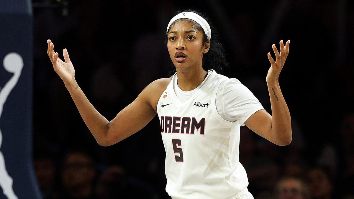 Angel Reese of the Atlanta Dream reacts during a basketball game at Target Center in Minneapolis