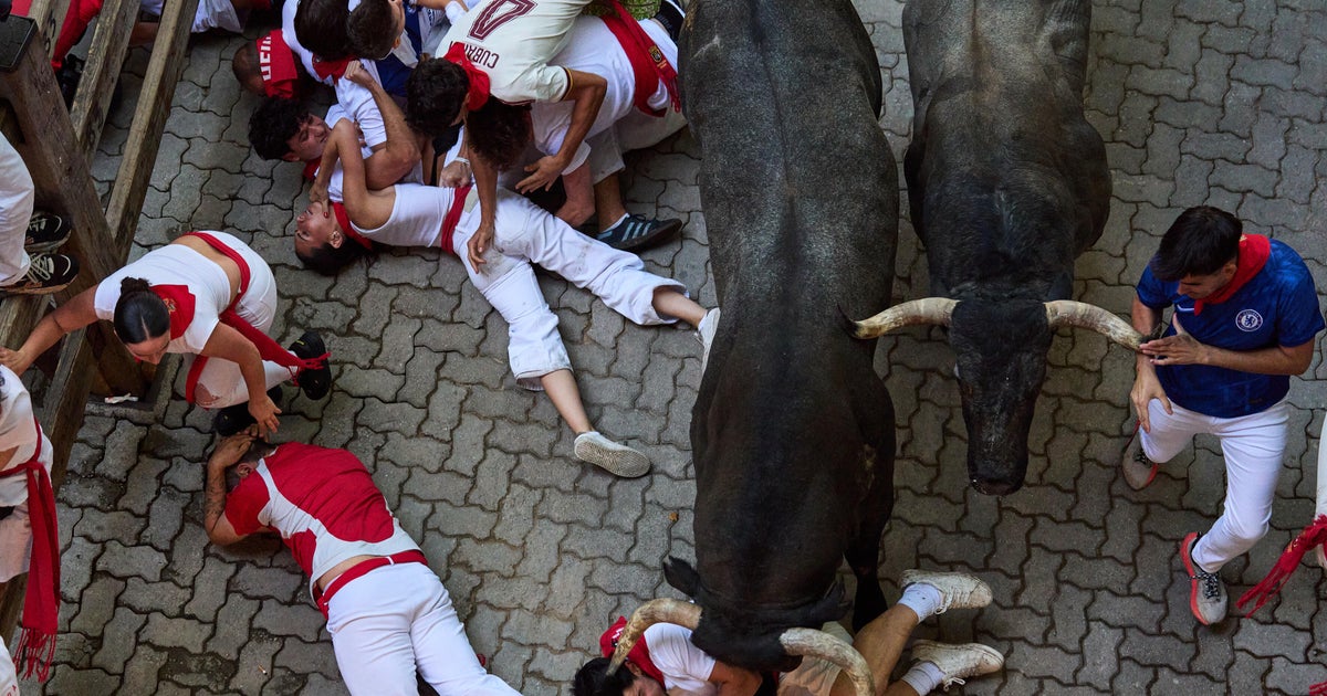 Bull gores runner in the face at Spain's San Fermin bull run festival, 12 others hurt