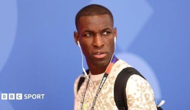 Nicolas Jackson with his headphones in while with Senegal's squad