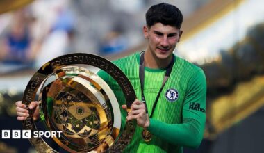 Mike Penders holding the Club World Cup trophy