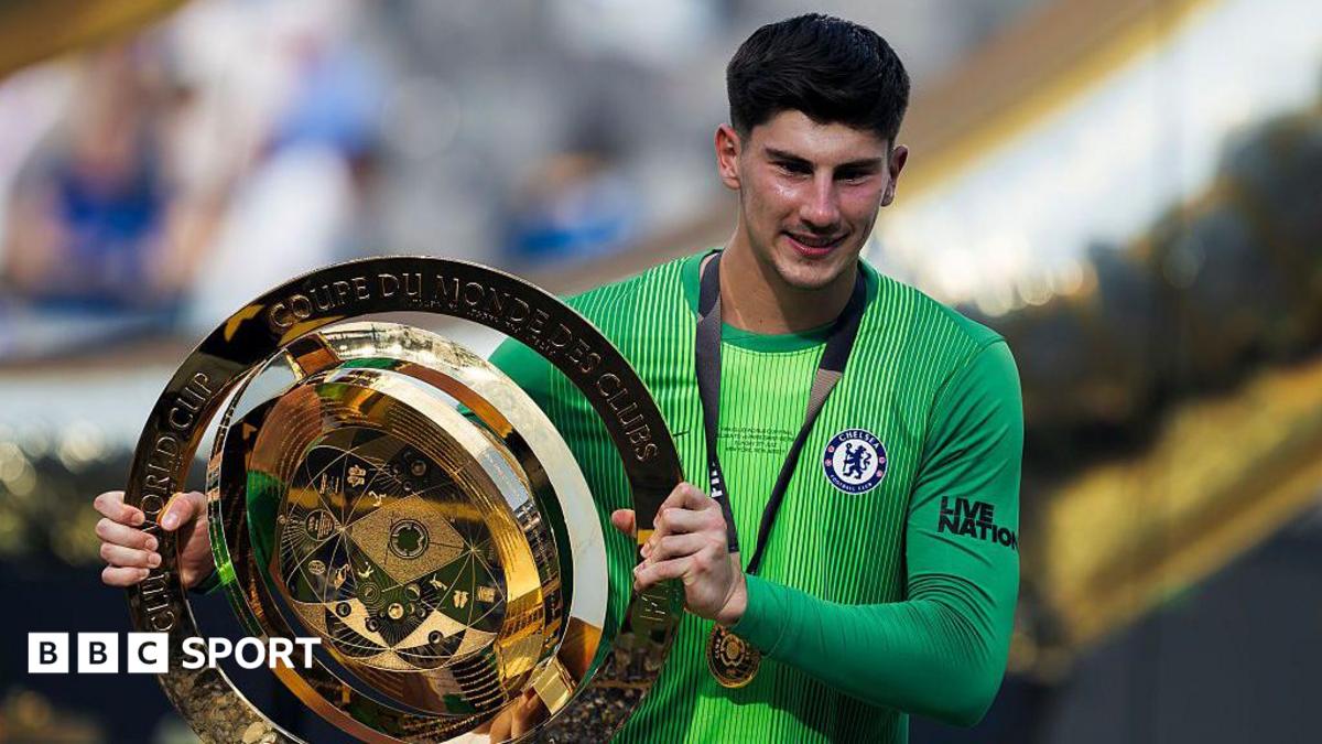 Mike Penders holding the Club World Cup trophy