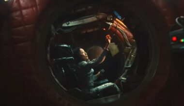 woman in cockpit of a small futuristic aircraft