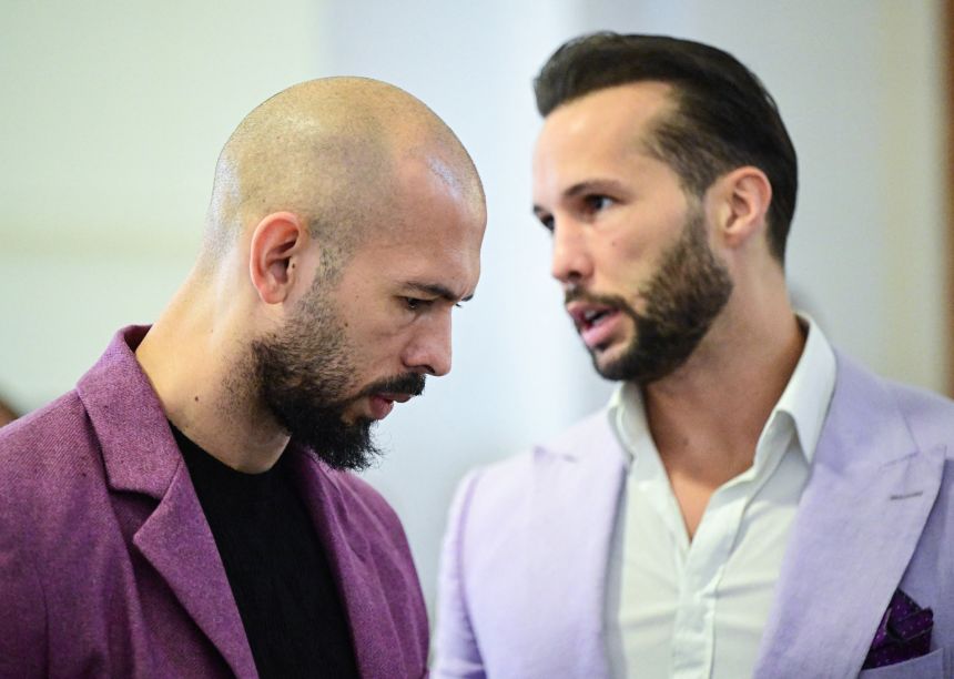 Andrew Tate, left, and his brother Tristan Tate, right, are pictured inside The Court of Appeal in Bucharest, Romania, on December 10, 2024.
