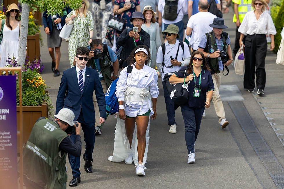 london, england july 01 naomi osaka of japan makes her way through the spectators for her match against anastasia gasanova in the second round of the ladies singles competition on no 2 court during the wimbledon lawn tennis championships at the all england lawn tennis and croquet club at wimbledon on july 1st, 2026, in london, england photo by tim claytongetty images