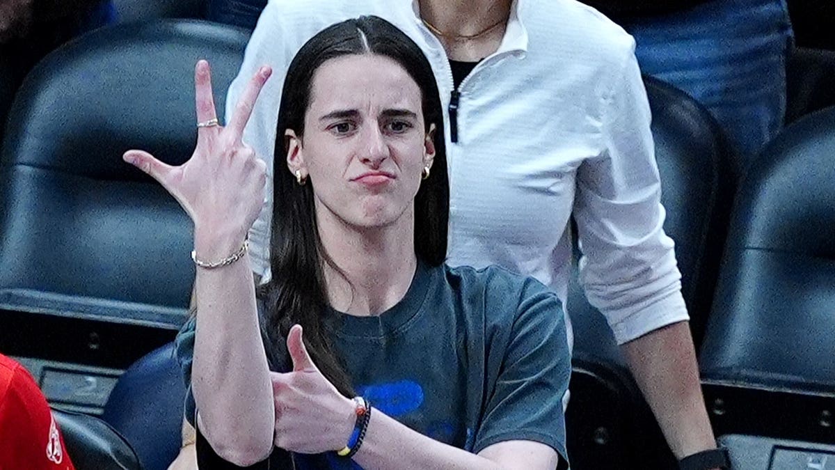 Caitlin Clark reacts on the sideline during an Indiana Fever game against Connecticut Sun.