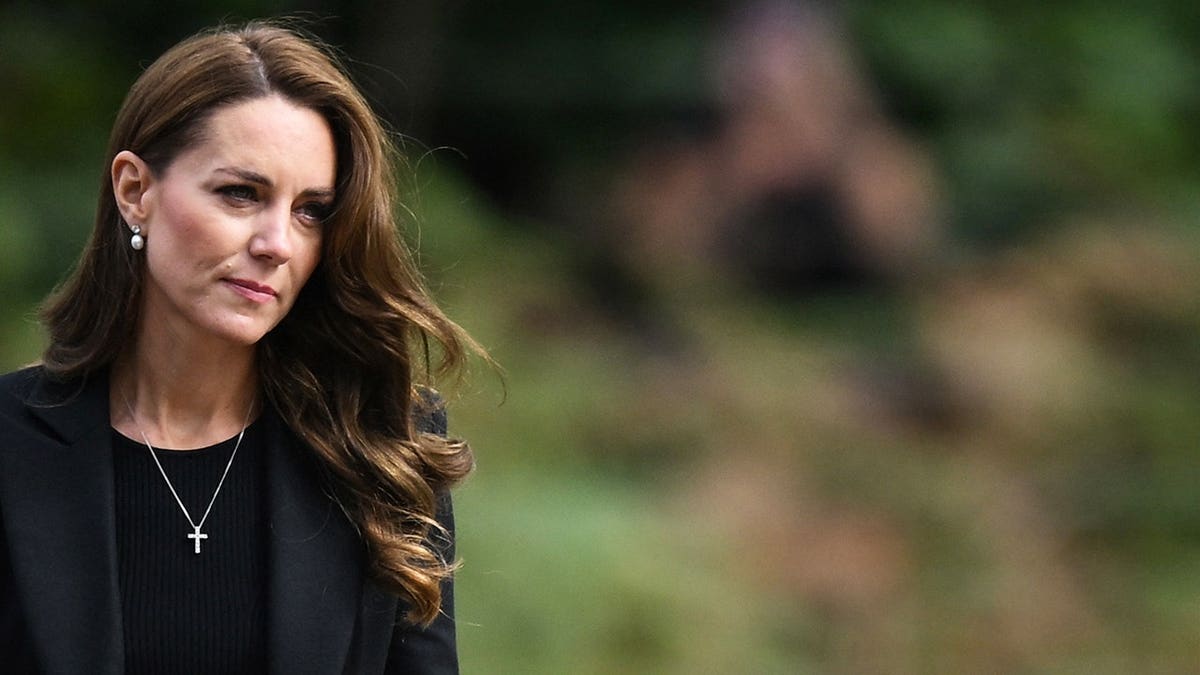 Catherine Princess of Wales looking at tributes outside Norwich Gate on Sandringham Estate