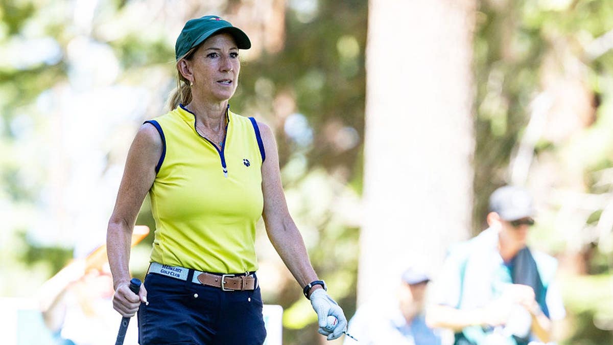 Cathy Engelbert walks on the golf course during the American Century Championship.