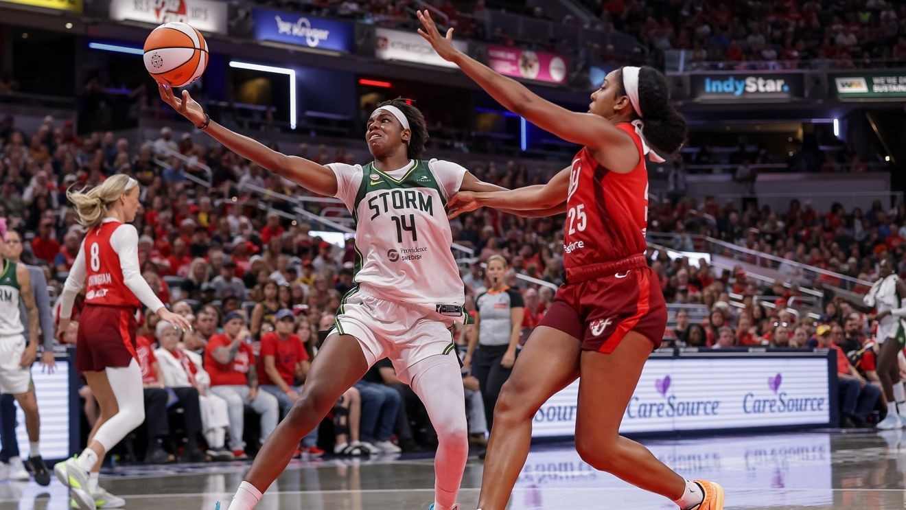 INDIANAPOLIS, INDIANA - JULY 17: Dominique Malonga #14 of the Seattle Storm reaches for the ball against Monique Billings #25 of the Indiana Fever during the second half at Gainbridge Fieldhouse on July 17, 2026 in Indianapolis, Indiana. NOTE TO USER: User expressly acknowledges and agrees that, by downloading and or using this photograph, User is consenting to the terms and conditions of the Getty Images License Agreement.  (Photo by Michael Hickey/Getty Images)