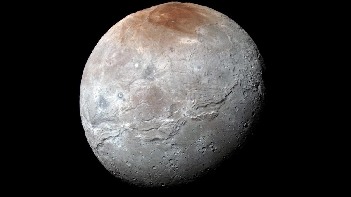 Weird Mountains on Pluto's Largest Moon Charon Reveals a Surprising Past