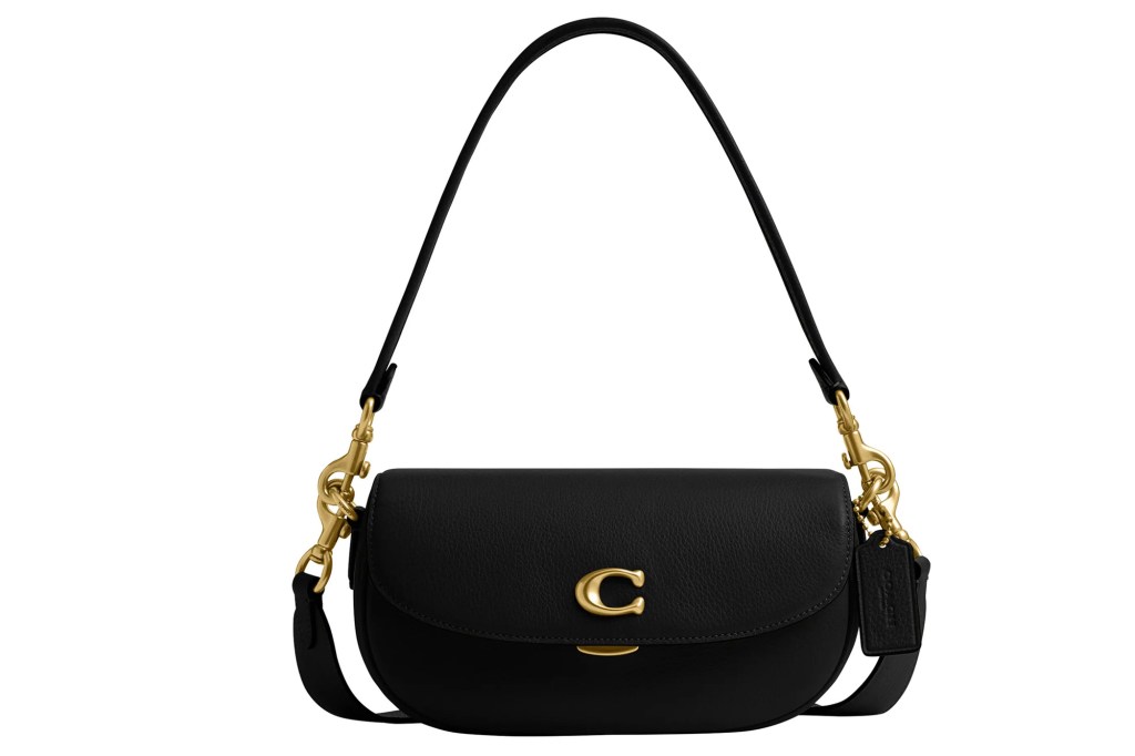 Black leather Coach shoulder bag with a gold "C" clasp and gold hardware.