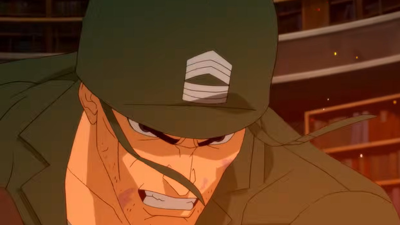 Sgt. Rock grimmicing in a burning library in DC Showcase: Sgt. Rock