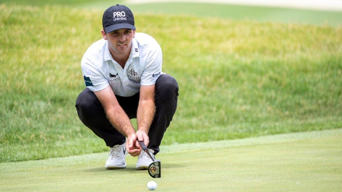 Denny McCarthy lines up a putt during the third round of the 2022 John Deere Classic at TPC Deere Run.