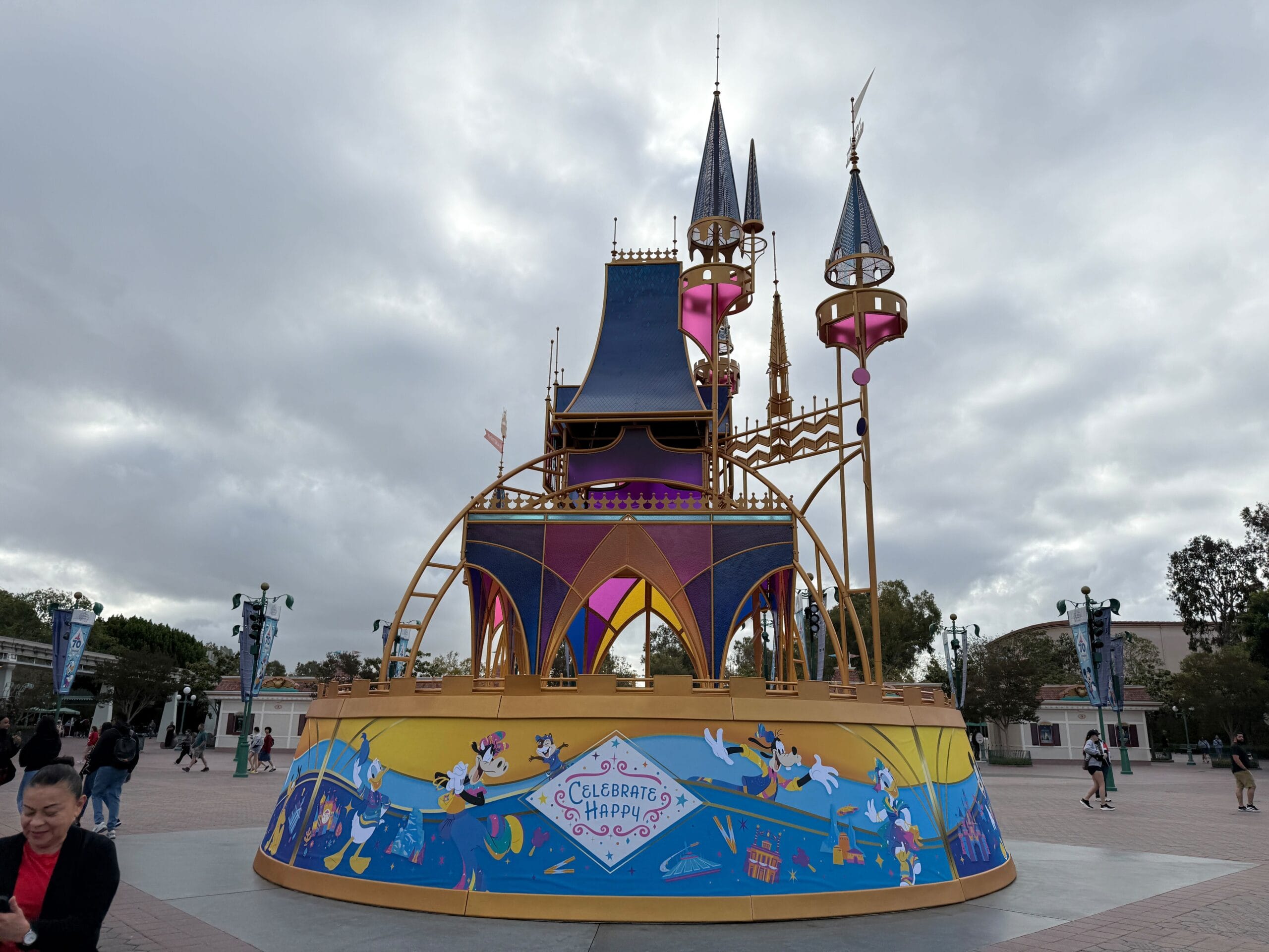 A colorful stage with Disney characters and