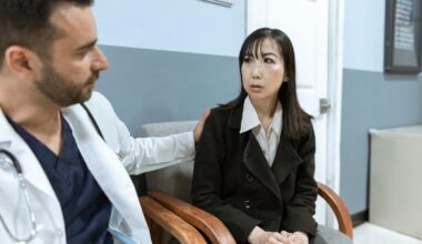 doctor comforting a professional woman