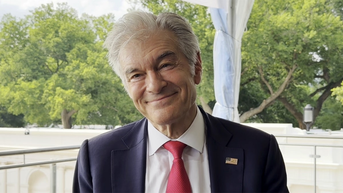 Dr. Mehmet Oz smiling