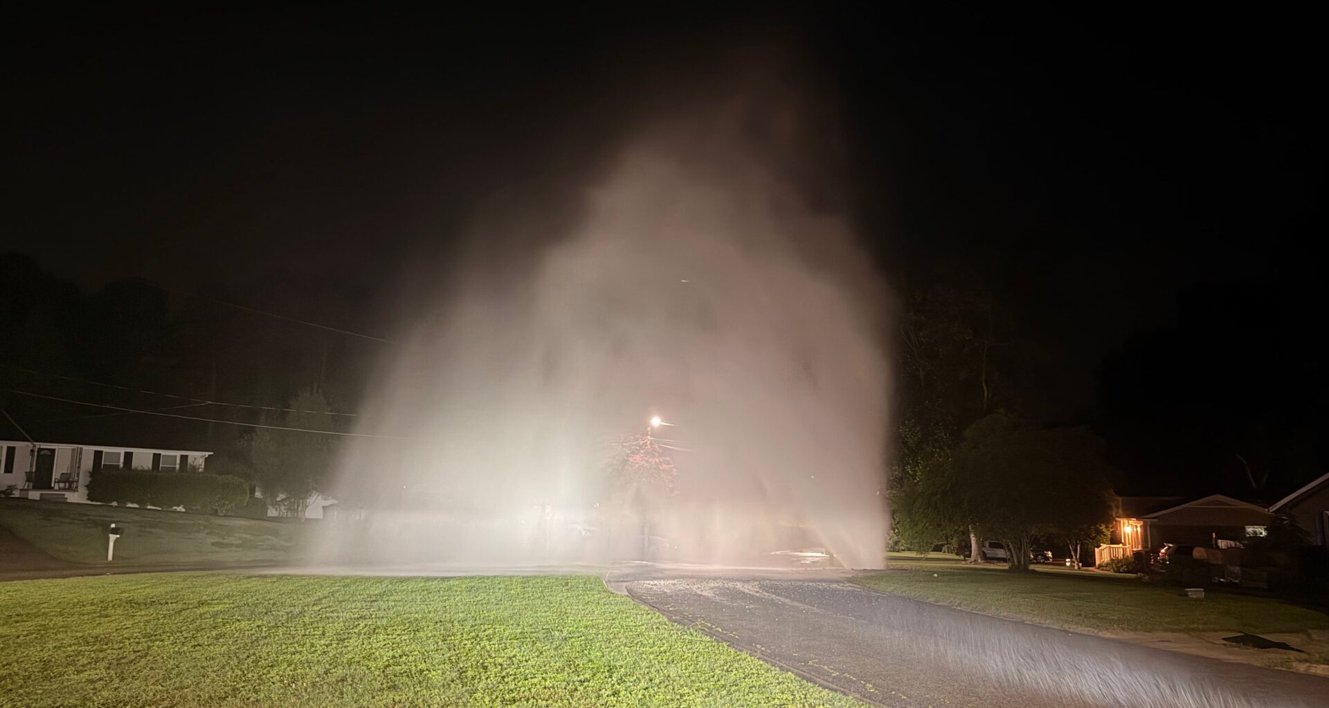 Forceful water main break in Durham creates tall fountain spewing from the ground