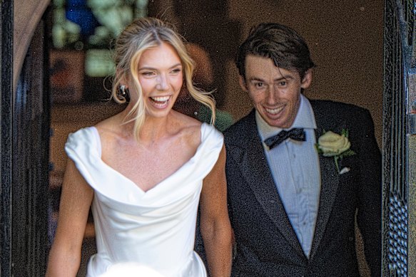 Katie Boulter and Alex de Minaur beam after tying the knot.