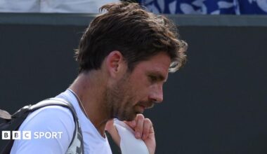 Cameron Norrie trudges off court at Wimbledon